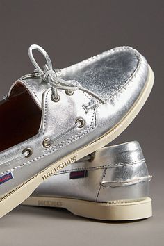 The Dockside collection is characterized by water-repellent construction, a non-slip sole, a hand-stitched apron, and distinctive stitching on the heel for added protection. | Portland Boat Shoes by Sebago in Silver, Women's, Size: 8.5, Leather/Rubber at Anthropologie Leather Boat Shoes With Round Toe For Outdoor, Silver Shoes, 50 Fashion, Stylish Shoes, Shoe Shop, Hand Stitched, Shoe Brands, Boat Shoes, Repellent