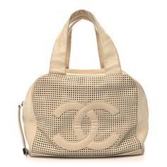 This is an authentic CHANEL Caviar Perforated Bowler in Beige. This stylish bowler-style tote is finely crafted of evenly square perforated beige caviar leather. The bag features leather top strap handles and an unperforated frontal Chanel CC logo patch. The top zipper opens to a beige Chanel name logo fabric interior with a zipper pocket. Chic Shopping Bags With Perforations, Chic Shopping Bag With Perforations, Designer Leather Bags With Perforations, Chic Leather Shoulder Bag With Perforations, Elegant Leather Shoulder Bag With Perforations, Chic Tote Bag With Perforations, Beige Shopping Bag With Pearl Handle, Luxury Perforated Shoulder Bag, Chanel Neutral Bag