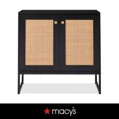 a black cabinet with two doors and wicker panels on the front, in an advertisement for macy's