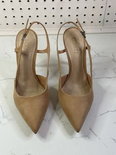 SCHUTZ Women's Boris Pointed Toe Slingback Pump Heels NWB Size 8.5B Color: Honey Beige Suede Elevate your shoe game with these Schutz Boris Honey Beige Slingback Suede Pumps. The pointed-toe stiletto design and patent leather upper material make for a sophisticated and stylish look. These pumps are perfect for any occasion, whether it be a night out or a special event. The slingback style adds an extra touch of elegance, and the beige color is versatile enough to pair with any outfit. These shoe Pump Heels, Suede Pumps, Slingback Pump, Women's Wardrobe, Shoe Game, Beige Color, Special Event, Pumps Heels, Shoes Women Heels