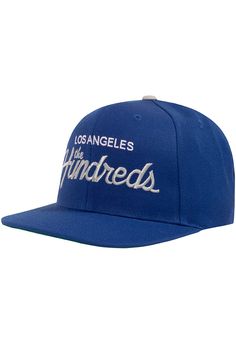 The Hundreds Team graphic embroidered on front panels Cotton Twill 6-panel structured snapback Snapback closure with Solid Bomb woven label on back left Sizes: One size fits most Colors: Blue, Off-White Blue Fitted Hat With Embroidered Logo For Streetwear, Six-panel Fitted Hat For Baseball Season, Blue Baseball Cap With Logo Patch And Flat Brim, Blue Six-panel Baseball Cap With Embroidered Logo, Blue Six-panel Fitted Hat With Embroidered Logo, Blue Hats With Letter Print For Streetwear, Blue Letter Print Hats For Streetwear, Blue Flat Brim Baseball Cap With Logo Patch, Flat Brim Fitted Hat With Letter Patch For Streetwear