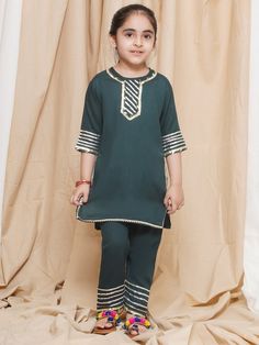 **Specifications : Please visit our brand store** https://www.etsy.com/in-en/shop/AJDezines?ref=seller-platform-mcnav Specially handcrafted clothing for the perfect look and comfort for the festive season 2 Pc Set : 1 Kurti and 1 Pyjama ||Style:- Kurta Salwar Set For Kids Girls Kurti : Solid Plain Kurti made in Rayon. Pajama : Solid Plain Pajama made in Rayon. Introduce your little one to the timeless elegance of traditional wear with this Girls' 3/4 Sleeve Salwar Suit adorned with Gota Patti de Festive Green Pant Set For Eid, Festive Matching Pant Set For Eid, Fitted Green Straight Kurta Pant Set, Festive Green Matching Set, Green Cotton Sets For Festivals, Green Pant Set With Straight Kurta For Navratri, Green Cotton Set For Festivals, Eid Green Cotton Pant Set, Festive Green Cotton Pant Set