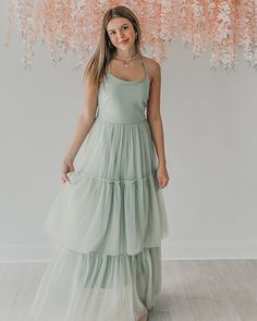 Some dresses are just made for beautiful destinations. The Wendy dress is just that with soft tulle and a beautiful tie back for a look that is dramatic yet down to earth. This is the women's version in mint, made to match with the girl's Wendy, Juliet and Fawn dresses in separate listings. Summer Bridesmaid Dress With Flowy Skirt, Chic Sage Dress For Spring, Chic Sleeveless Dress In Sage Color, Sleeveless Sage Dresses For Spring, Sage Sleeveless Dresses For Spring, Chic Sage Summer Dress, Light Green Summer Wedding Dress, Green Summer Maxi Dress For Bridesmaids, Green Maxi Dress For Summer Bridesmaid