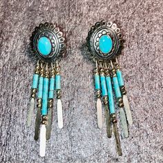 Real “Robin’s Egg Blue” Turquoise And Sterling Silver Navajo Earrings Handcrafted By Q. T. Quoc, A Jewelry Designer That Worked In Albuquerque, New Mexico For Over 40 Years. Vintage Blossom Motif With Tassels. High Quality Circular “Tiffany” Style Backs. Circa 1980s Or Earlier. Rare! Euc. Note; All Vintage/Antique Pieces/Jewelry Are Sold As Is, Photographed As Accurately As Possible. Gorgeous Earrings That Are Much More Impressive In Person. Blue Bohemian Sterling Silver Earrings, Southwestern Style Blue Pierced Earrings, Southwestern Style Blue Earrings For Pierced Ears, Southwestern Blue Earrings For Pierced Ears, Blue Concho Dangle Earrings, Artisan Blue Earrings For Festival, Handmade Blue Bohemian Clip-on Earrings, Nickel-free Blue Southwestern Earrings, Southwestern Style Blue Earrings For Festivals