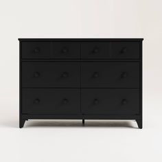 a black dresser with four drawers and two doors