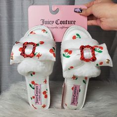 -Super Cute White Slippers With Red "Jc" Logo And Cherry Hearts All Over Them -Has Faux Fur Band With Silk Bow On The Top With Red Rhinstone Brooch In The Middle + Gold "Jc" Logo Charm On The Bow (Brooch Cannot Be Taken Off) -Has Rubber Sole -Cozy And Comfy -"Juicy Couture " Logo Tag Near The Heel Of The Slippers -White Jc-Gailee Slippers -New With Tags. No Damages Size : S (5/6) M (6.5/7.5) L (8/9) Xl (9.5/10.5) Heart Slippers, Fur Band, Fem Outfits, Cherry Hearts, Juicy Couture Boots, Juicy Couture Logo, Slippers White, Fav Products, White Slippers