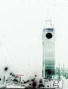 the big ben clock tower towering over the city of london in england on a foggy day