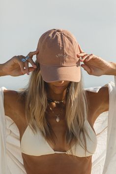 FINAL SALE. Our long awaited logo dad hat. This baseball cap is made from a soft cotton and has an easy fit with an adjustable strap on the back. Rock this muted sage color out and about with all your casual looks. Cute Outfits With Caps, Summer Outfits With Baseball Hats, Hat Product Photography, Cap Poses, Clothing Brand Photography, Cap Pictures, Sunrise Shoot, Hat Pictures, Hat Photoshoot