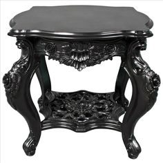 a black table with an ornate design on the top and bottom, sitting against a white background