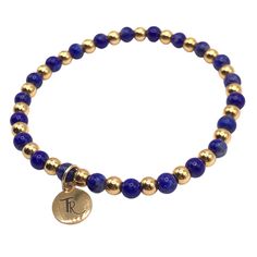 Blue Lapis Lazuli and Gold Beaded Stretch Bracelet Accented with 18K gold filled 4mm beads 4mm deep blue lapis beads Every bracelet I design is carefully thought out and crafted. Each individual bead is selected for its color, vibrancy, and size. I pay careful attention to how each bracelet lays on the wrist, how they nestle together as a stack, and how comfortable they are to wear together and individually. size: small 6.5" - 7"size: med 7" - 7.5" Blue Stretch Bracelet With Gold Round Beads, Blue Stretch Bracelet With Gold Beads, Gold Lapis Lazuli Beaded Bracelets With Round Beads, Hand-strung Gold Lapis Lazuli Bracelets, Gold Beaded Lapis Lazuli Bracelets, Gold Charm Bracelet With Gemstone Round Beads, Gold Lapis Lazuli Spiritual Bracelets, Gold Lapis Lazuli Bracelets For Gift, Lapis Lazuli Blue