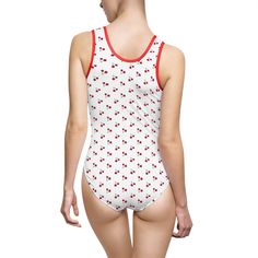 Cherry print swimsuit. Classic fit with modest back, chest, and bottom coverage. 83% Nylon 17% Spandex Light fabric (5.26 oz/yd² (178 g/m²)) Runs smaller than usual XS S M L XL 2XL 3XL Width at armpits, in 13.39 14.17 14.96 15.75 16.54 17.32 18.11 Waist width, in 11.81 12.60 13.39 14.17 14.96 15.75 16.54 Hip width, in 14.17 14.96 15.75 16.54 17.32 18.11 18.90 Side length, in 10.24 10.63 11.02 11.42 11.81 12.20 12.60 Length across front, in 21.26 21.65 22.05 22.44 22.83 23.23 23.62 Fitted Casual Bodysuit For Sunbathing, Red Fitted Leotard For Summer, Fitted Elastane Leotard For Swimming, White Fitted Swimwear For Water Polo, Red Elastane Swimwear, Fitted Elastane Tankini For Swimming, Red Cherry Print Swimwear For Summer, Red Cherry Print Swimwear, Red Cherry Print Swimwear For Beach