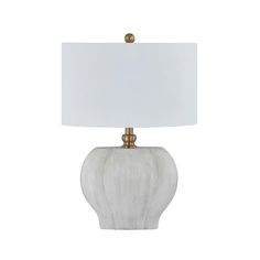 a table lamp with a white shade on it