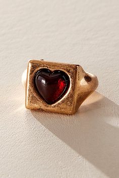 Add the sweetest little something to your jewelry collection with this stunning ring featuring a heart-adorned square on a subtly distressed metal band for a true lived-in, vintage-inspired look. | Running On Love Ring by Free People in Gold, Size: 7 Funky Rings, Graduation Rings, Origami Jewelry, Costume Rings, Chunky Rings, Rings Cool, Vintage Heart, Metal Band, Love Ring