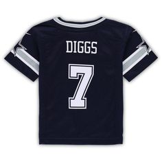 When Trevon Diggs is on the field, opposing teams take notice, so help your youngster show some love for one of the top players in the NFL with this exclusive Dallas Cowboys Game jersey from Nike. Complete with mesh panels for extra breathability, this jersey replicates the authentic one that Trevon Diggs wears every Sunday, giving your young fan the perfect piece of gear for every Dallas Cowboys game this season. Machine wash, tumble dry low Sewn-on NFL Shield at collar Nike Game Brand: Nike Ma Nike Tops In Football Team Colors For Football Season, Nike Tops For Football Season In Team Colors, Nike Tops For Football Season Sports Events, Throwback Sports Top For Football Season, Nike Tops For Football Season, Throwback Top For Football Season, Navy Team Name Football Tops, Navy Tops With Team Name For Football Season, Nike Navy Tops Team Spirit