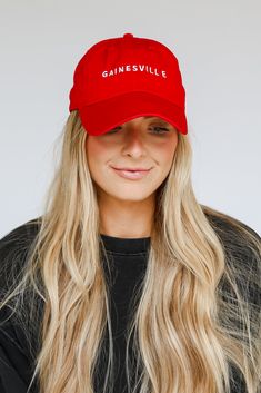 Calling all Gainesville residents, the Gainesville Embroidered Hat was made just for you! This cute hat is made of a soft cotton construction. It has a rounded top and a slightly rounded brim with "Gainesville" embroidered on the front! Adjustable Strap Embroidered 100% Cotton Spot Clean with Damp Cloth or Sponge One Size Fits Most Collegiate Cotton Hat With Flat Brim, Collegiate Style Cotton Hat With Flat Brim, Collegiate Cotton Flat Brim Hat, Collegiate Cotton Trucker Hat With Curved Brim, Cotton Snapback Hat For Fan Gear, Fan Gear Visor Hat, One Size Fits Most, Curved Brim Cotton Fitted Hat For Fan Gear, Cotton Curved Bill Dad Hat For Fan Gear, Cotton Dad Hat With Curved Bill For Fan Gear