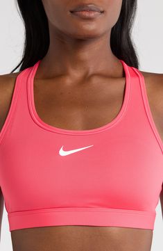 Work up a sweat on and off the pickleball court in this padded sports bra featuring wide straps and signature moisture-wicking tech. Racerback Dri-FIT moisture-wicking technology Lined 72% polyester, 28% spandex Machine wash, line dry Imported