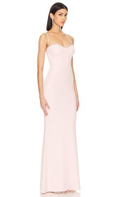 Find KATIE MAY Yasmin Gown on Editorialist. Katie May Yasmin Gown in Blush. - size L (also in M, S, XL, XS, XXS) Katie May Yasmin Gown in Blush. - size L (also in M, S, XL, XS, XXS) It's rare to find a dress that balances the line of charm and flirtation, but the Katie May Yasmin Gown in Blush has pulled it off. With a boned bodice and underwire bust, this gown exudes charm and allure. Crafted in crepe fabric with delicate neckline loops, it's the epitome of gentle femininity. Step into the allure of pastel perfection, perfect for any formal occasion. Don't just follow trends, set them.. Self: 97% polyester 3% spandex Lining: 100% polyester. Made in USA. Dry clean only. Partially lined. Hidden back zipper closure Adjustable shoulder straps. Boned bodice with underwire bust Crepe fabric wit Pre-draped Fitted Evening Dress For Wedding Guest, Fitted Crepe Maxi Dress For Gala, Fitted Crepe Floor-length Dress, Fitted Floor-length Crepe Dress, Feminine Fitted Gown For Gala, Fitted Silk Crepe Floor-length Maxi Dress, Fitted Feminine Gown For Gala, Fitted Silk Crepe Maxi Dress, Fitted Crepe Evening Dress