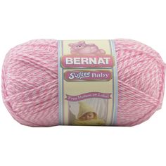 a ball of pink yarn with the label bernat super - soft, on white background