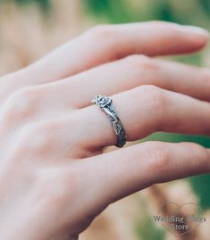 A beautiful rose bloomed on a tiny branch with leaves - and turned out a unique silver ring for her. A romantic gift for a lover Wedding Jewelry With Roses In Sterling Silver, Wedding Jewelry In Sterling Silver With Roses, Dainty Rose Design Flower Promise Ring, Sterling Silver Rose Flower Ring For Wedding, Rose Flower Sterling Silver Wedding Ring, Rose Flower Ring In Sterling Silver For Wedding, Silver Flower Jewelry For Proposal, Rose Color Sterling Silver Flower Ring For Wedding, Rose Sterling Silver Wedding Rings