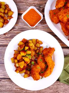 three plates with different types of food on them and sauce in the bowl next to it