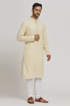 Beige cotton kurta with thread embroidery. Comes with churidar. - Aza Fashions Cotton Silk Sherwani With Chikankari Embroidery For Puja, Transitional Cotton Silk Kurta With Chikankari Embroidery, Diwali Cotton Silk Kurta With Chikankari Embroidery, Festive Cotton Silk Churidar With Chikankari Embroidery, Traditional Drape Kurta With Chikankari For Puja, Traditional Chikankari Kurta For Puja, Traditional Chikankari Embroidery Kurta For Puja, Festive Cotton Sherwani With Cutdana, Transitional Cotton Sherwani With Chikankari Embroidery