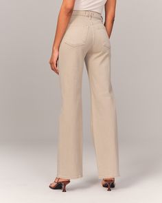 On-trend 90's-style high rise relaxed jeans, that are slim at the top with a wider leg shape, featuring a full-length leg, oat wash and clean hem. High Waist Mom Fit Jeans For Fall, Chic Spring Mom Fit Jeans, Spring High Rise Mom Jeans, Casual Beige Flare Jeans For Summer, Beige Relaxed Fit Flare Jeans For Spring, Beige High Waist Flare Jeans For Fall, Beige Denim Flare Jeans For Fall, Wide Leg Mom Fit Bottoms For Fall, Mom Fit Wide Leg Bottoms For Everyday