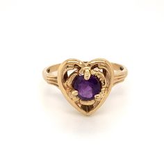 FREE shipping on all orders! FREE 5 Day Returns! Learn More. From our Vintage collection, one-of-a-kind, the perfect gift for Valentine's Day! Our Sweetheart Amethyst 14K Yellow Gold Ring. Size 5.75. Sweetheart features a 5.00 MM round faceted amethyst set in a circle within a heart motif. The heart wants what the heart wants. Size: 5.75 Hallmarks: ESEMCO 14K Total Piece Weight: 1.20 dwt Do Good: We donate 2% of monthly SALES to Girls Not Brides org members. Vintage jewelry may contain minor mar Vintage Gold Amethyst Birthstone Ring, Vintage Ring Jewelry For Valentine's Day, Heirloom Heart Ring With Birthstone For Valentine's Day, Victorian Heart-shaped Anniversary Rings, Heirloom Heart-shaped Gemstone Ring, Valentine's Day Heirloom Heart Ring With Birthstone, Elegant Amethyst Heart-shaped Birthstone Ring, Vintage Purple Amethyst Ring Stamped 14k, Vintage Yellow Gold Heart Ring