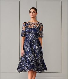 Eliza J Illusion Boat Neck Short Sleeve Sequin Embroidered Floral Lace Midi Dress | Dillard's Floral Applique Lace A-line Dress, Short Sleeve Party Dress With Illusion Neckline, Short Sleeve Dress With Illusion Neckline For Party, Party Dress With Illusion Neckline And Short Sleeves, Lace Dresses With Illusion Neckline And Short Sleeves, Lace Dress With Illusion Neckline And Short Sleeves, Party Dresses With Floral Applique And Short Sleeves, Elegant Short Sleeve Dresses With Illusion Neckline, Lace A-line Dress With Floral Applique