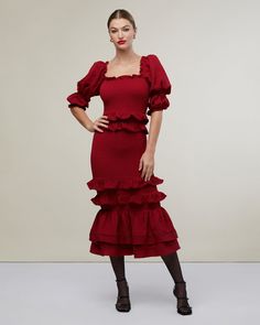 Romantic embellishments are at the heart of this jacquard dress. Smocked all over to create a body-hugging fit, it features ruffles along the square neckline and the puff sleeves, while several more, edged with picot, detail the waist and long, fluttery skirt. Lattice lace trim encircles the tiered hemline. Neckline ruffle Puff sleeve with ruffle Fully smocked body Two waistline ruffles with picot trim Two ruffles at skirt with picot trim 2 skirt bottom tiers with inset ladder lace trim 96% Poly Fitted Puff Sleeve Midi Dress With Smocked Back, Elegant Fitted Smocked Dress With Ruched Detail, Elegant Fitted Smocked Ruched Dress, Fitted Square Neck Dress With Smocked Back, Elegant Fitted Ruched Smocked Dress, Fitted Midi Dress With Smocked Back And Tiered Skirt, Fitted Midi Dress With Ruched Tiered Skirt, Fitted Midi Dress With Ruffles And Tiered Skirt, Chic Fitted Smocked Party Dress