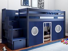 a blue bunk bed with stairs and storage drawers on the bottom level, in a child's bedroom