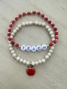 Teacher Bracelet Set! Gift for Teacher and Teacher Appreciation. One red and gold bracelet that can be customized with your teacher's name or standard lettering including "TEACH" "LEARN" or "INSPIRE" and a coordinating neutral gemstone bracelet with a Red Apple charm. Wonderful gift for your student's favorite teacher. Great gift for a graduate with a teaching degree. Gift for Educator. DESCRIPTION: * Red 4mm Czech Fire Polish beaded bracelet with gold accents with your choice of lettering or pe Christmas Teacher Bracelets, Teacher Bead Bracelet, Personalized Adjustable Red Name Bracelet, Personalized Red Adjustable Name Bracelet, Personalized Red Name Bracelet With Round Beads, Red Adjustable Personalized Stretch Bracelet, Adjustable Personalized Red Stretch Bracelet, Red Adjustable Stretch Bracelet, Personalized, Customizable White Bracelets For Teacher Appreciation