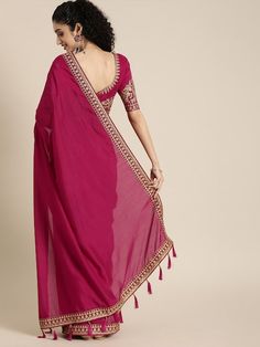 Magenta pink solid saree and has a zari borderThe model is wearing a stitched version of the blouse piece. The saree comes with an unstitched blouse piece. Eid Puja Pre-draped Saree With Embroidered Border, Navratri Pre-draped Saree With Border, Dola Silk Pre-draped Saree With Embroidered Border For Puja, Festival Georgette Pre-draped Saree With Border, Pink Georgette Pre-draped Saree With Embroidered Border, Diwali Dola Silk Pre-draped Saree With Border, Pink Pre-draped Saree With Embroidered Border In Georgette, Pink Pre-draped Georgette Saree With Embroidered Border, Semi-stitched Bollywood Blouse Piece With Embroidered Border