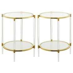 two glass and brass side tables