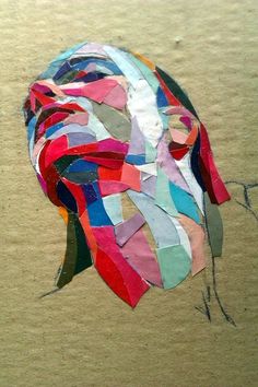 a piece of art made out of colored paper