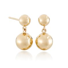 Our gold earrings offer a graceful cascade of warmth, their dual beads dancing with light for a quietly captivating effect. Since 1861, Gump's has been a destination for jewelry that is distinctive, extraordinary and timeless. Featuring only the finest materials, each piece is a statement of elegance. 14-karat yellow gold beads, 6mm and 9.5mm. Pierced only. 5/8" long. Formal 14k Gold Earrings With Timeless Design, Elegant 14k Gold Earrings With Timeless Design, 14k Gold Fine Jewelry Earrings With Timeless Design, 14k Gold Fine Jewelry Earrings, 14k Gold Earrings With Timeless Design, Timeless Yellow Gold Dangle Pearl Earrings, Timeless Dangle Earrings With Polished Finish, Classic Sphere Yellow Gold Jewelry, Classic Yellow Gold Spherical Jewelry