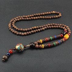 Gender:Men's,Women's; Quantity:1pc; Theme:Buddha; Shape:Geometric; Style:Vintage; Jewelry Type:Long Necklace,Beaded Necklace,Pendant Necklace; Occasion:Gift,Daily,Street; Material:Acrylic,Wooden; Length of Necklace:80; Design:Retro; Features:Wearable; Listing Date:07/28/2022; 2022 Trends:Handmade Cheap Trendy Jewelry, Cheap Necklaces, Necklace Ideas, Daily Gift, Necklace Pendants, Multi Pattern, Women Street, Palau, Necklace Beaded