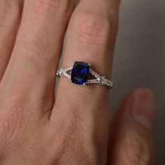 This is a gorgeous handmade creation. Its beauty is its simplicity & Elegance. The 6*8mm cushion cut lab sapphire is crafted in sterling silver with rhodium plated. It's made to order and it will take about 7-10 days to make it. All item is sent in a beautiful gift box You can realize more lovely stuff clicking the link https://www.etsy.com/shop/knightjewelry?refshopsection_shophome_leftnav Please leave the correct address and you phone number for delivering successfully. Sapphire Ring Silver, Blue Sapphire Engagement Ring, Sapphire Engagement Ring, Split Shank, Ring Promise, Sapphire Engagement, Beautiful Gift Boxes, Ring Silver, Cushion Cut