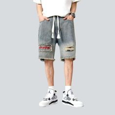 Take your city trend to a whole new level with our 2023 Summer Collection Contrast Overlapped Ripped Denim Shorts. Showcasing a mid-rise fit. zipper & button closure. and slouchy silhouette. these shorts bring together vintage allure and couture fashion. making them perfect for any occasion. Key Features: Retro & Contemporary: The perfect blend of vintage allure and today's spirited vogue pulse. Mid-Waist Fit: Showcase sun-kissed skin and radiant confidence with a flattering mid-waistline shape. Casual Denim Blue Bottoms With Patches, Trendy Frayed Hem Jean Shorts For Streetwear, Trendy Jean Shorts With Frayed Hem For Streetwear, Trendy Ripped Shorts For Streetwear, Denim Bottoms With Patches For Streetwear, Casual Ripped Medium Wash Shorts, Trendy Ripped Denim Jean Shorts, Casual Medium Wash Ripped Shorts, Trendy Ripped Denim Shorts