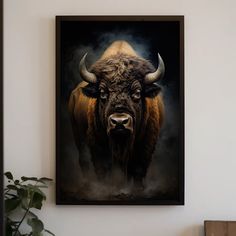 a painting of a bison is hanging on the wall