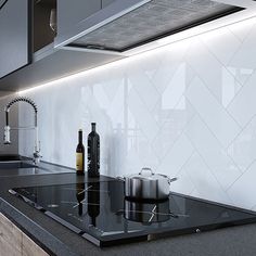 a stove top oven sitting inside of a kitchen next to a sink and countertop