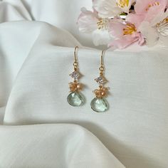 Gemma. A dainty green amethyst gemstone earring with a bit of sparkle for your everyday accessory.  Simple, elegant and lightweight. Diamond Briolette Earrings For Wedding, Elegant Teardrop Gemstones For Wedding, Elegant Teardrop Wedding Gemstones, Elegant Gemstones With Diamond Accents For Wedding, Elegant Wedding Gemstones With Diamond Accents, Elegant Teardrop Gemstones For Anniversary, Elegant Faceted Pear-shaped Earrings, Wedding Amethyst Gemstones With Diamond Accents, Elegant Pear-shaped Faceted Earrings