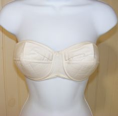 Beige Fitted Bra With Padded Cups, Fitted Beige Bra With Padded Cups, Fitted Underbust Bra Partially Lined, Fitted Strapless Bra With Padded Cups, Fitted Full Coverage Cream Bra, Fitted Partially Lined Strapless Bra, Fitted Strapless Bra Partially Lined, Fitted Padded Beige Bra, Fitted Beige Bra With Removable Pads