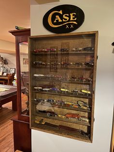 a display case filled with lots of toy cars