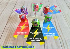 four candy lollipops are on a plate with the words, you're not included