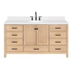 an image of a bathroom vanity with drawers and two faucets on the sink