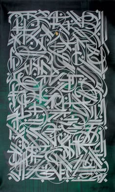 an art work with white letters on green paper