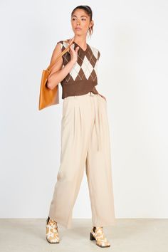 These beige pleated long trousers offer an understated look with cool sophistication. Enjoy the smooth fabric and impeccable tailoring that will make these trousers a staple in your wardrobe for years to come. - Extra long belt - Classic, timeless style - Quality fabric and impeccable tailoring Classic Beige Wide Leg Pants With Belt Loops, Tailoring Measurements, Belted Trousers, London Free, Long Trousers, Timeless Style, Extra Long, Timeless Fashion, Quality Fabric