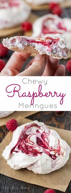 the raspberry meringue is being held up in front of some raspberries