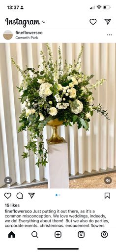 an instagram page with white flowers and greenery in a gold vase on a pedestal