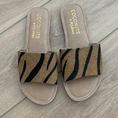 Nwt Coconuts Zebra Print Slip On Sandal . Size 8. Brown Flat Mules For The Beach, Trendy Brown Slip-on Sandals, Brown Flat Heel Sandals For Day Out, Brown Slide Mules For Vacation, Casual Brown Mules For Vacation, Brown Slip-on Mules For Beach, Brown Flat Heel Mules For Beach, Brown Open Toe Summer Mules, Summer Brown Open Toe Mules